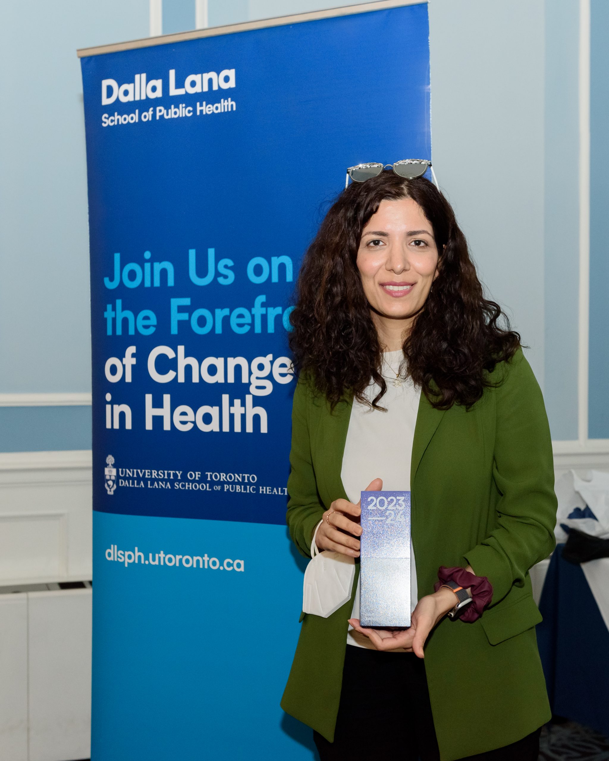 Image of Zahra Shakeri receiving an award at the 2024 PHS Faculty Awards