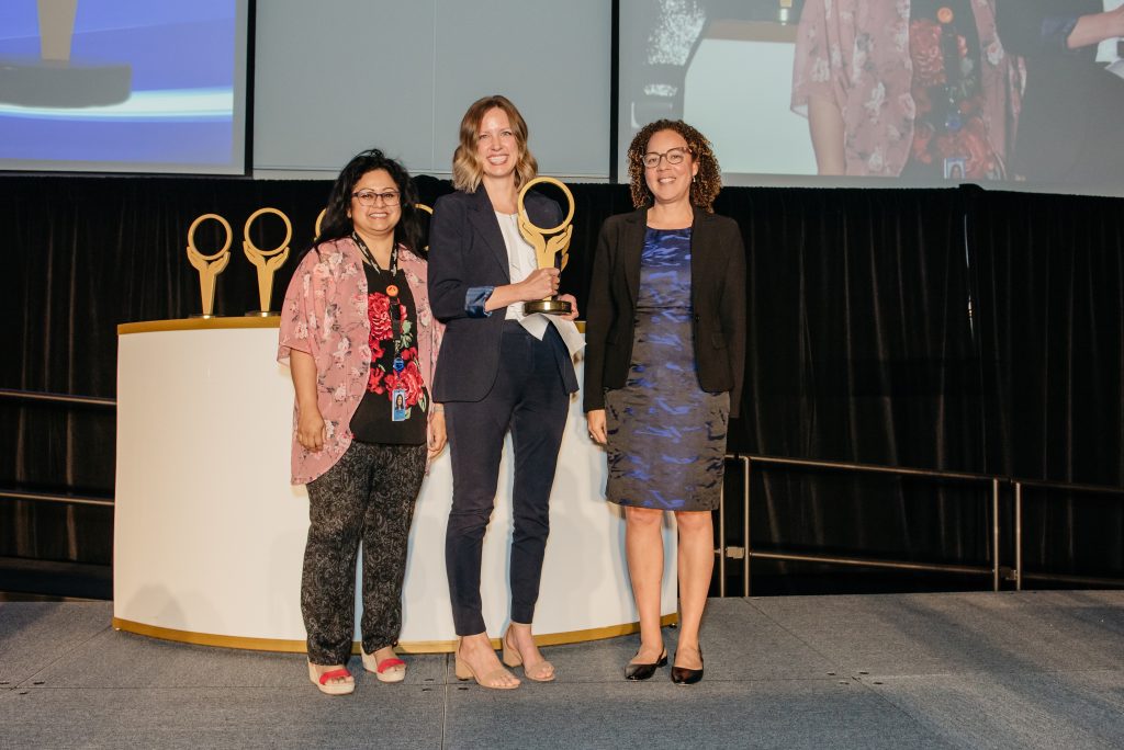 Image of Anna Greenberg presenting the Increased Equity Award at the Ontario Health System Quality and Innovation Awards Ceremony to the Mobile Medical Support Team